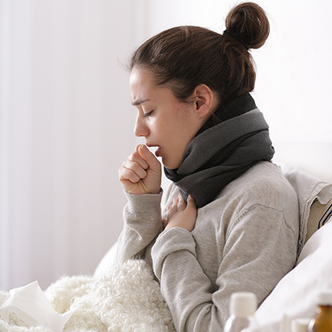 woman experiencing cold symptoms