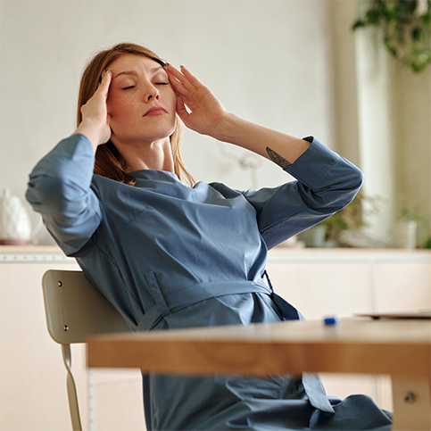 woman suffering from headache pain