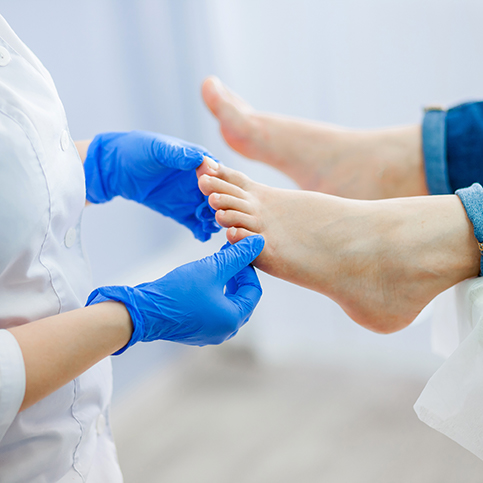 person receiving treatment for foot pain