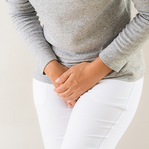 woman experiencing yeast infection symptoms